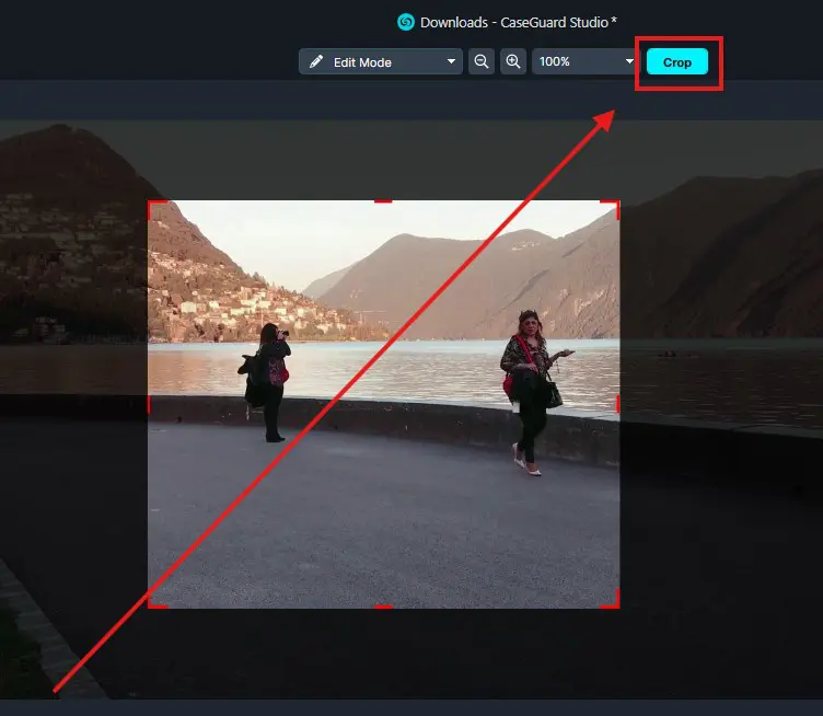 crop-button 1 | CaseGuard Photo editor: crop tool active on a lakeside image with two people; Crop button highlighted.