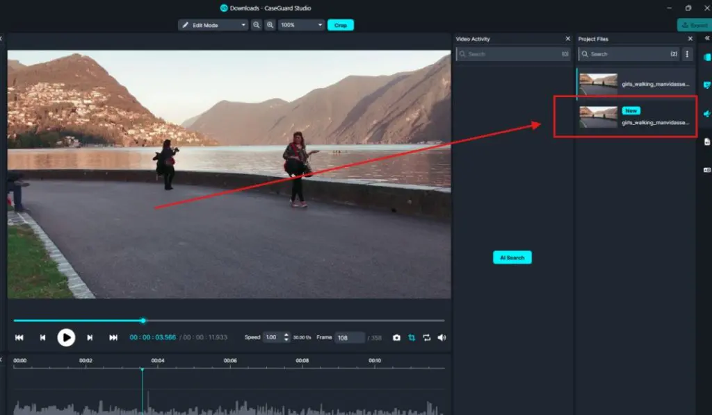 exported-snapshot | CaseGuard Video editing interface with a waterfront scene showing two people walking, and the clip highlighted in the project panel on the right.