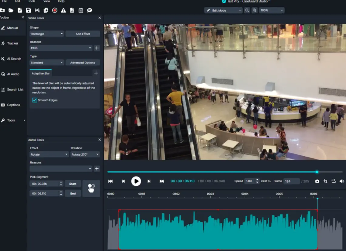 Screenshot of video editor UI showing a mall scene on the preview, left panels with Shape and Audio Tools, and a timeline with waveform beneath.