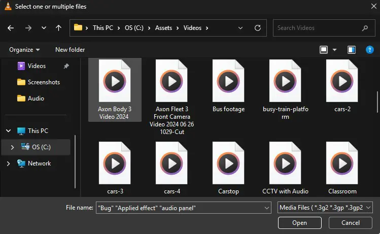 Windows Open dialog showing a folder of video files in Assets/Videos, with VLC-style icons and filenames like 'Axon Body 3 Video 2024', 'Bus footage', and 'cars-2'.