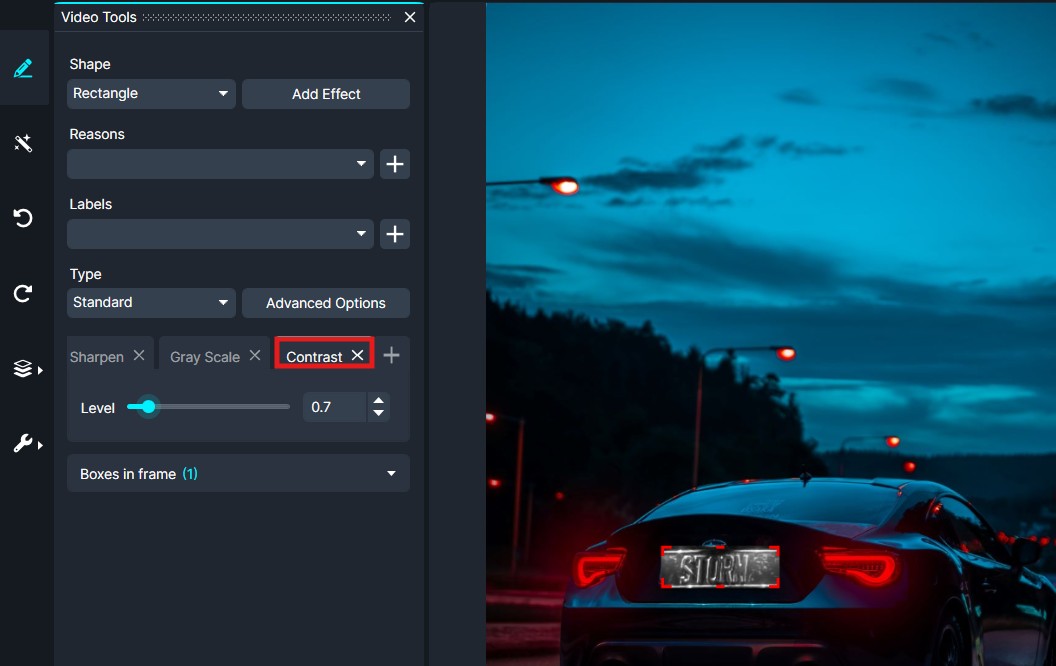 Contrast | CaseGuard Screenshot of video editing software showing the contrast adjustment panel and a blue nighttime car scene in the preview area.