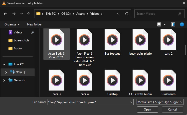 Open file dialog showing video icons in the Videos folder (This PC > OS (C:) > Assets > Videos).